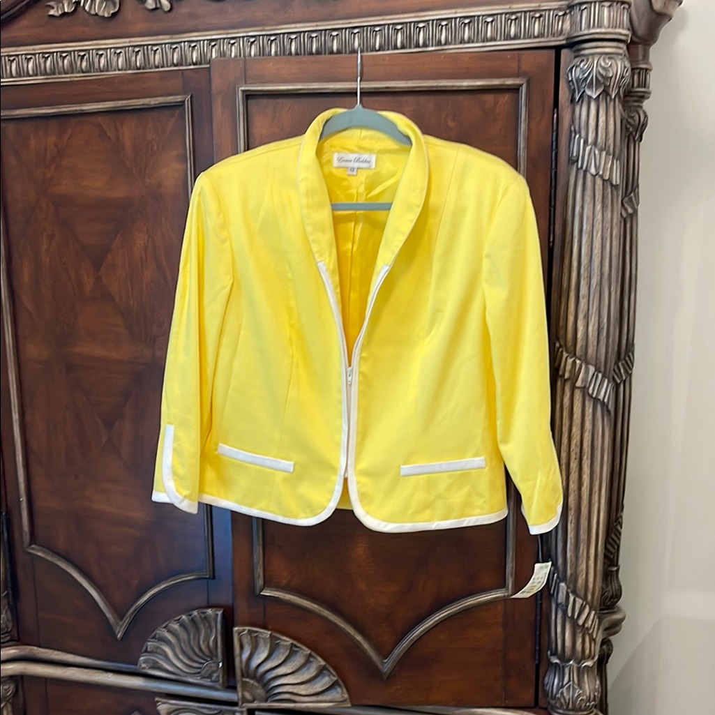 Bright Yellow Jacket With White Trim And Skirt